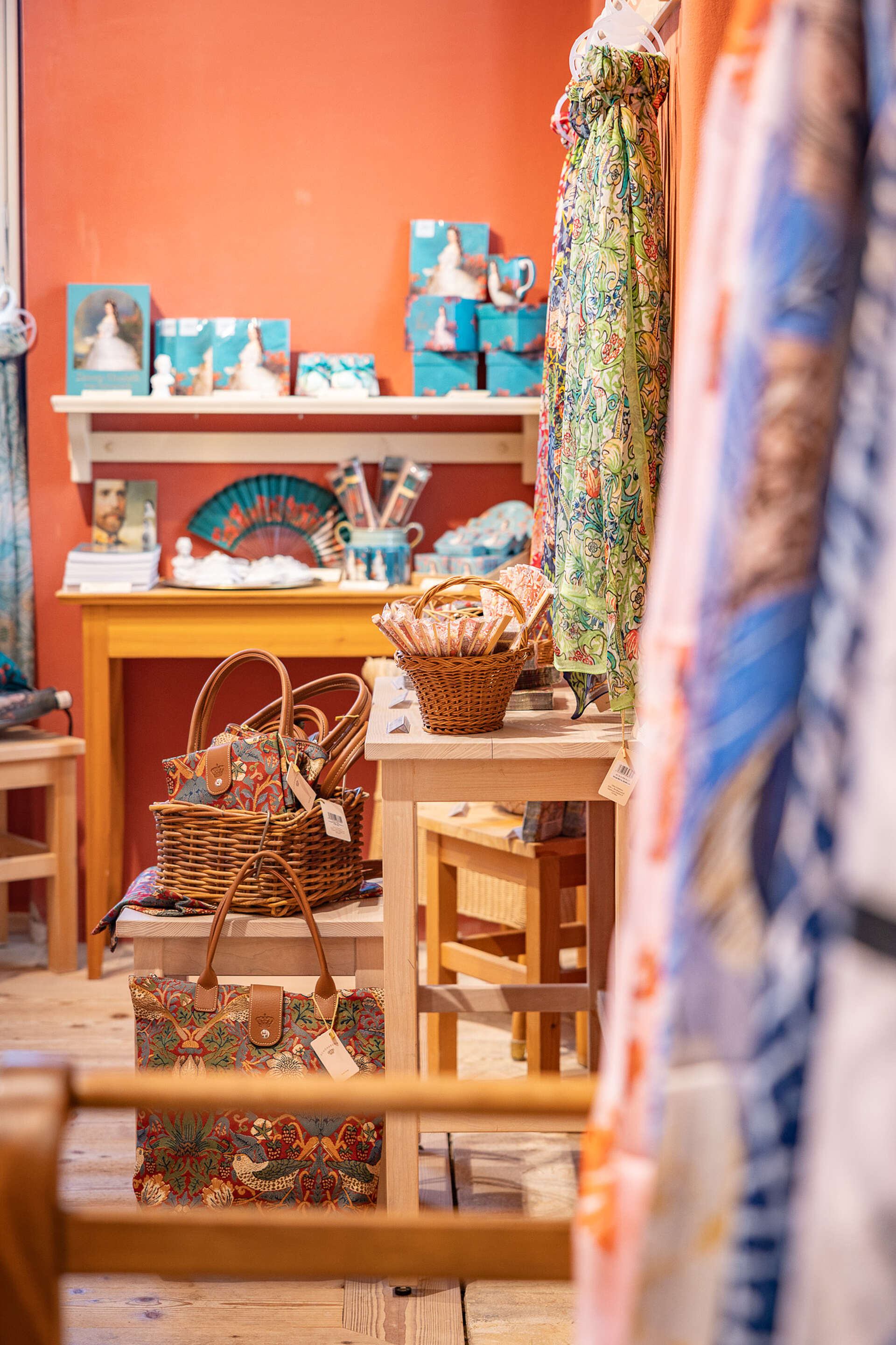 Baskets, scarves, and Sisi souvenirs in the background
